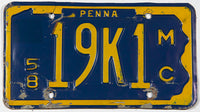 An antique 1958 Pennsylvania motorcycle license plate in very good conditin with some bends in the metal
