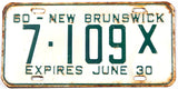 A classic 1960 NOS New Brunswick half year commercial license plate in very good minus condition