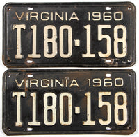 A pair of 1960 Virginia truck license plates in very good minus condition with some bending