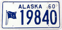 A classic 1960 Alaska passenger car license plate in very good plus condition
