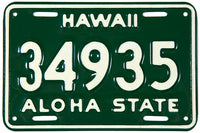 A 1961 to 1968 Hawaii Motorcycle license plate grading near mint
