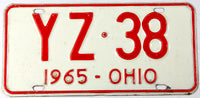 A classic 1965 Ohio passenger car license plate in very good condition