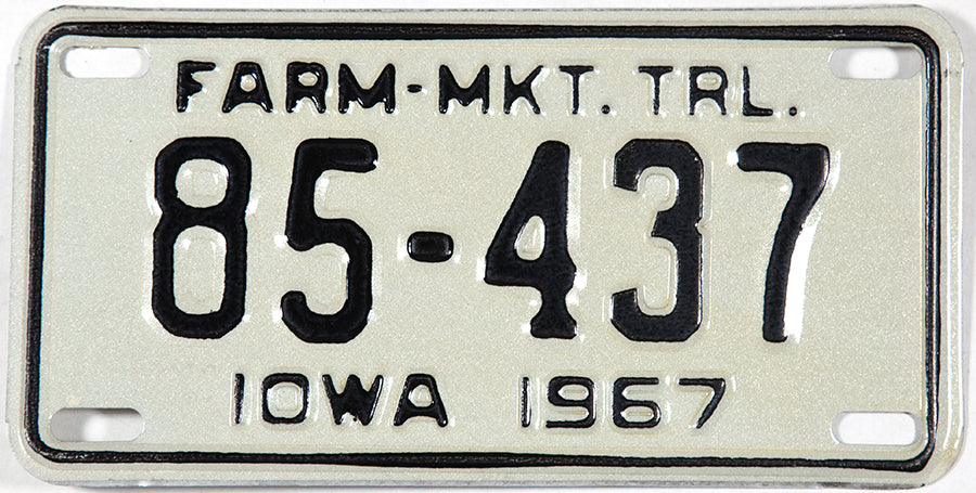 A 1967 Iowa Farm Market Trailer License Plate grading NOS Near Mint.