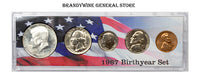 A 1967 Birth Year coin set which includes the 40% silver Kennedy Half Dollar, Washington Quarter, Roosevelt Dime, Jefferson Nickel and Lincoln Cent for sale by Brandywine General Store
