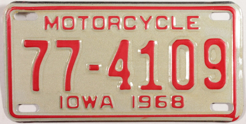 A NOS 1968 Iowa Motorcycle License Plate that is in Excellent Plus condition