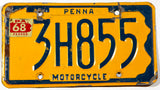 A classic 1968 Pennsylvania motorcycle license plate in very good condition with a split in the metal 