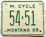 1969 Montana motorcycle license plate in very good condition with bends