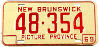 A 1969 New Brunswick Canadian car license plate in very good condition