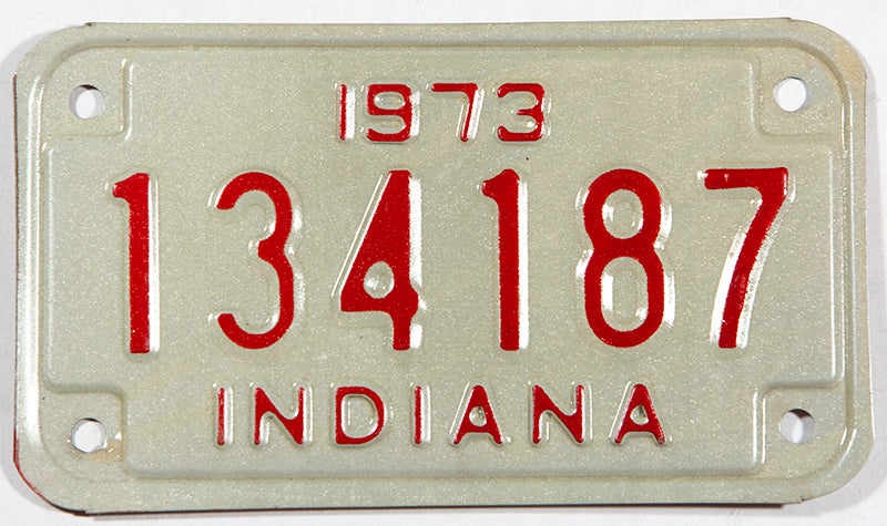 1973 Indiana motorcycle license plate in New Old Stock excellent minus condition