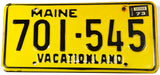 A classic 1973 Maine DMV car license plate in excellent minus condition