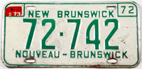 A classic 1973 New Brunswick passenger car license plate in very good minus condition