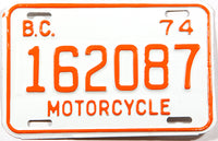 A classic 1974 British Columbia motorcycle license plate in New Old Stock Excellent Plus condition