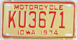 An unused new old stock 1974 Iowa Motorcycle License Plate grading Excellent