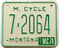 A classic 1974 Montana motorcycle license plate in New Old Stock excellent condition