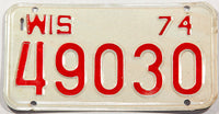 A classic 1974 Wisconsin motorcycle license plate in NOS excellent condition