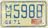 A slightly used 1975 Georgia Motorcycle License Plate in very good condition