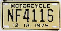 An Antique 1975 Iowa Motorcycle License Plate which is NOS, never been used, and will grade excellent plus