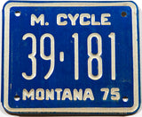 A 1975 Montana Motorcycle License Plate for sale by Brandywine General Store in unused excellent condition
