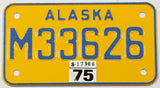 1975 Alaska motorcycle license plate in New Old Stock Near mint condition with wrapper