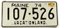 A classic 1975 Maine DMV car license plate in excellent minus condition