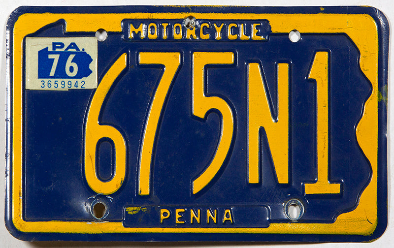 A classic 1976 Pennsylvania motorcycle license plate in excellent minus condition with one extra hole