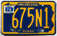 A classic 1976 Pennsylvania motorcycle license plate in excellent minus condition with one extra hole