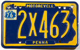 A classic 1976 Pennsylvania motorcycle license plate in excellent minus condition with four extra holes at the top