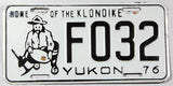 A 1976 Faro Yukon passenger car license plate in excellent minus condition