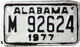 An unused NOS 1977 Alabama Motorcycle License Plate grading Excellent minus