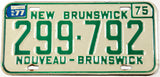 A classic 1977 New Brunswick passenger car license plate in very good plus condition