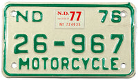 A classic 1977 North Dakota motorcycle license plate  in very good plus condition