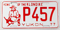 A 1977 Yukon passenger car license plate in excellent minus condition