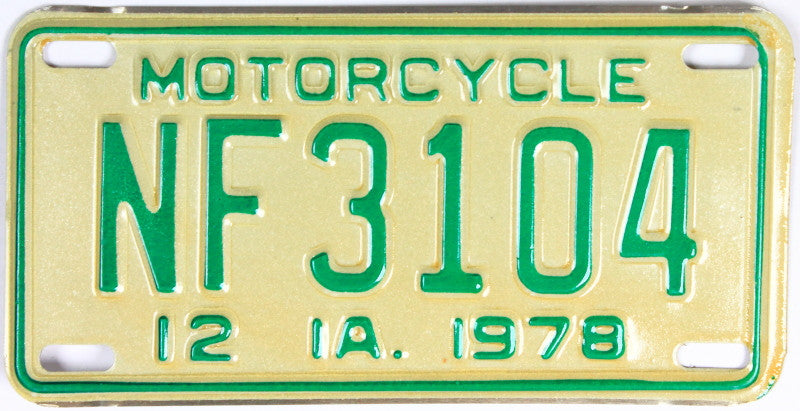 A classic new old stock 1978 Iowa Motorcycle License Plate that will grade excellent plus