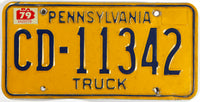 A classic 1979 Pennsylvania truck license plate in very good condition
