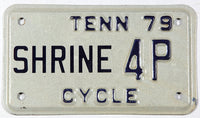 A classic 1979 Tennessee Shriners Motorcycle License Plate in NOS Excellent Minus condition