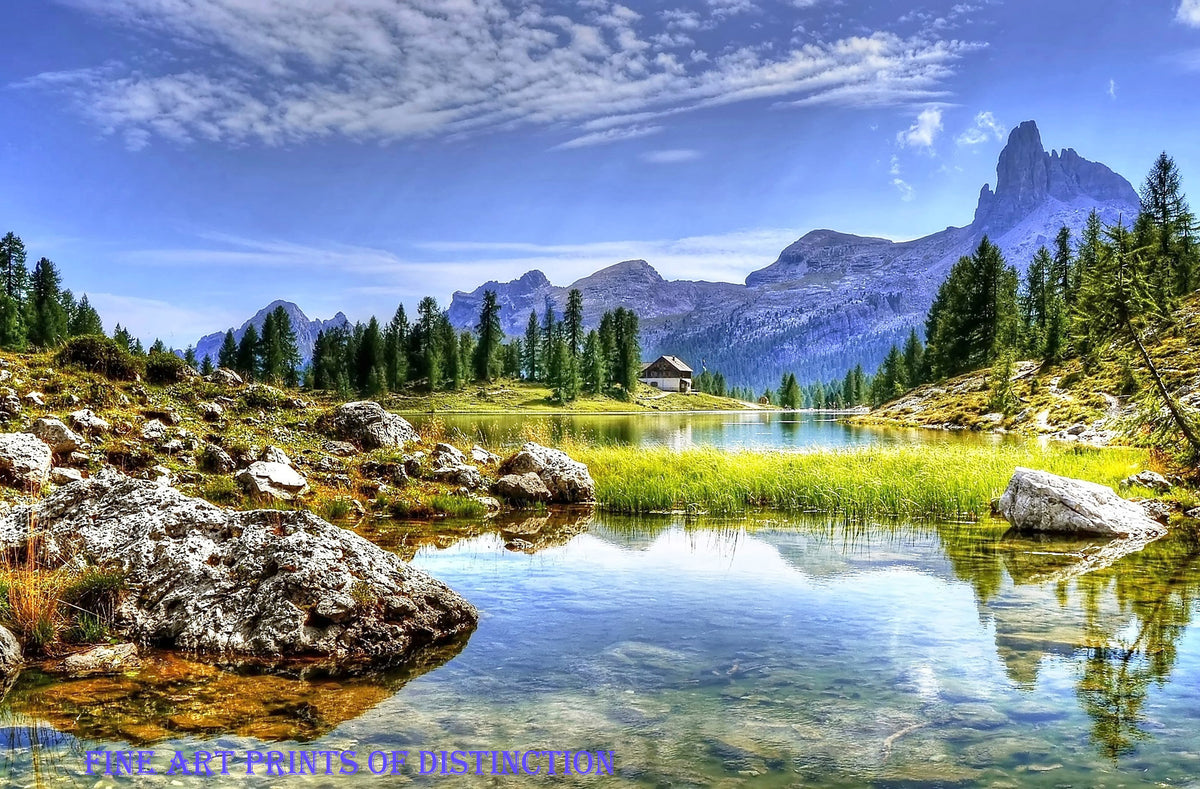 Cabin at the Water's Edge in a Mountainous Landscape Premium Print