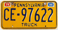 A classic 1980 Pennsylvania truck license plate in very good condition
