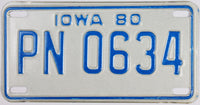 A 1980 Iowa Motorcycle License Plate that is in excellent plus condition