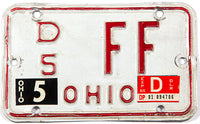 A vintage 1980 Ohio motorcycle dealer license plate in very good plus condition