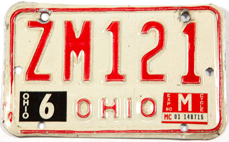 A vintage 1980 Ohio motorcycle license plate in very good plus condition