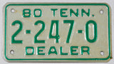 A classic 1980 Tennessee Motorcycle Dealer License Plate in excellent minus condition