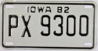 A new old stock 1982 Iowa Motorcycle License Plate that grades excellent plus