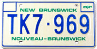 A 1987 New Brunswick Trailer License Plate in new old stock excellent plus condition
