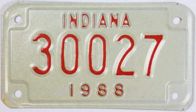 A New Old Stock 1988 Indiana Motorcycle License Plate grading Excellent