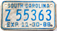 A 1988 South Carolina Motorcycle license plate in very good minus condition with darkening of the reflective coating