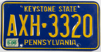 A classic 1996 Pennsylvania Passenger Automobile License Plate grading excellent minus