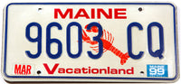 A scenic 1999 Maine Lobster automobile license plate in excellent minus condition