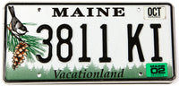 A scenic 2002 Maine Chickadee car license plate in excellent plus condition