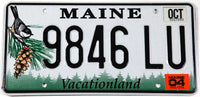 A classic 2004 Maine passenger car license plate in New Old Stock Near Mint condition