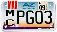 A scenic 2009 Arizona motorcycle license plate in excellent minus condition